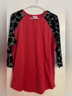 LuLaRoe Coral Raglan Top with Black Geometric Sleeves